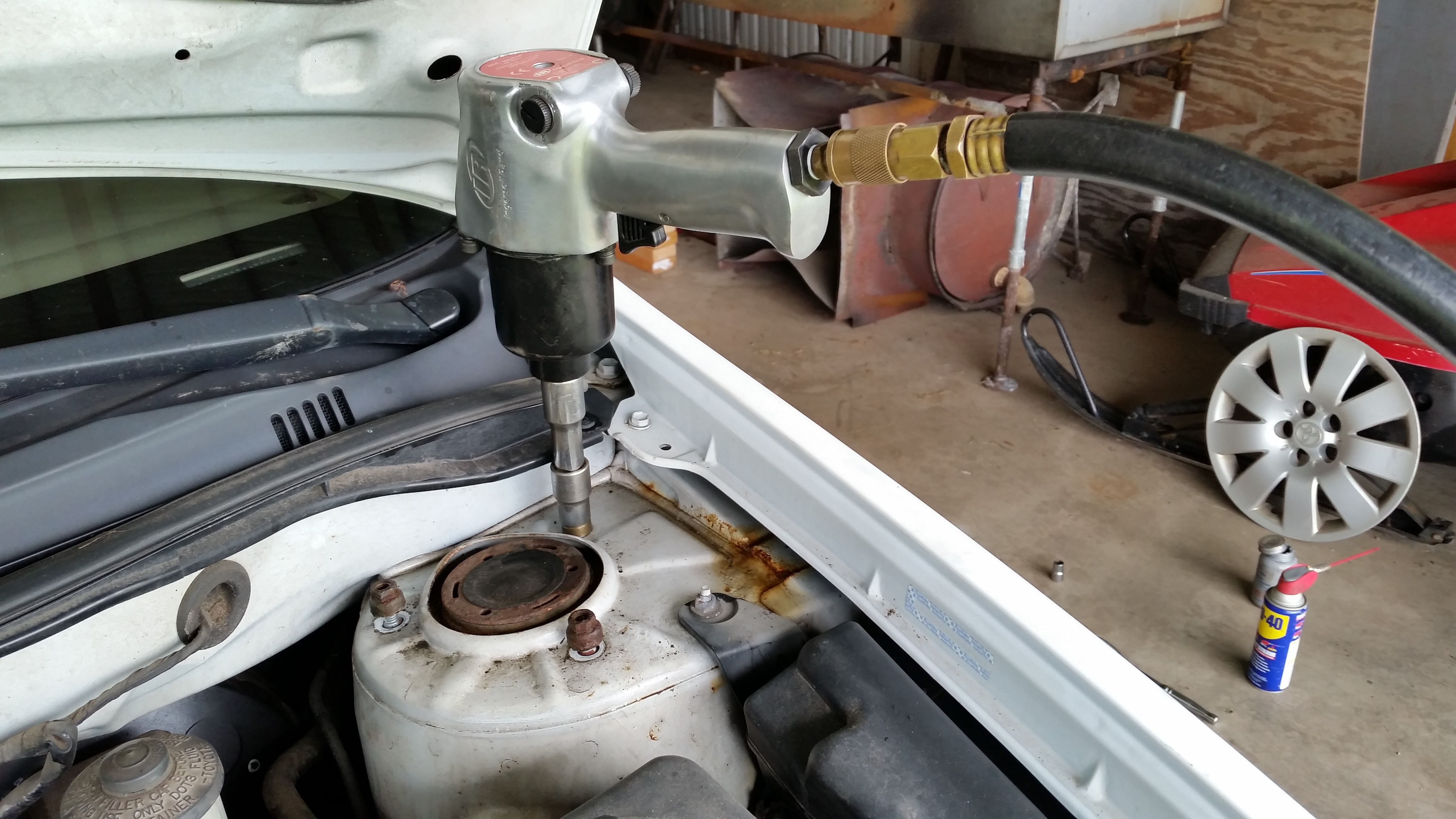 Removing the old strut assembly