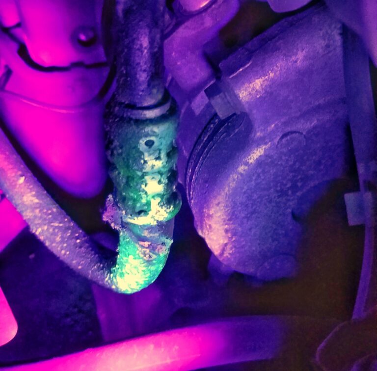 Leak in the AC system as shown with UV dye.