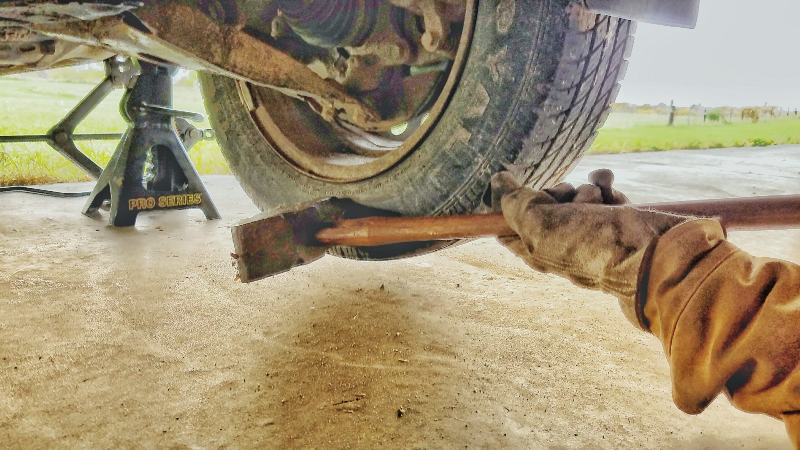 Pound outward with a sledge hammer on the wheel.