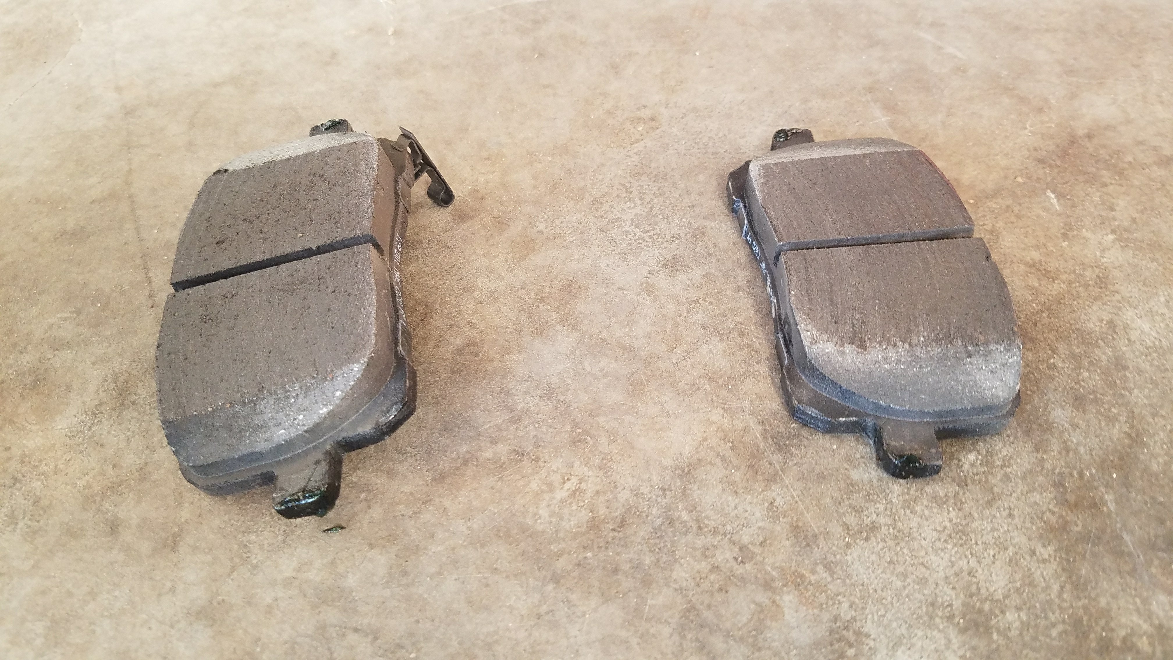 Set aside the brake pads.