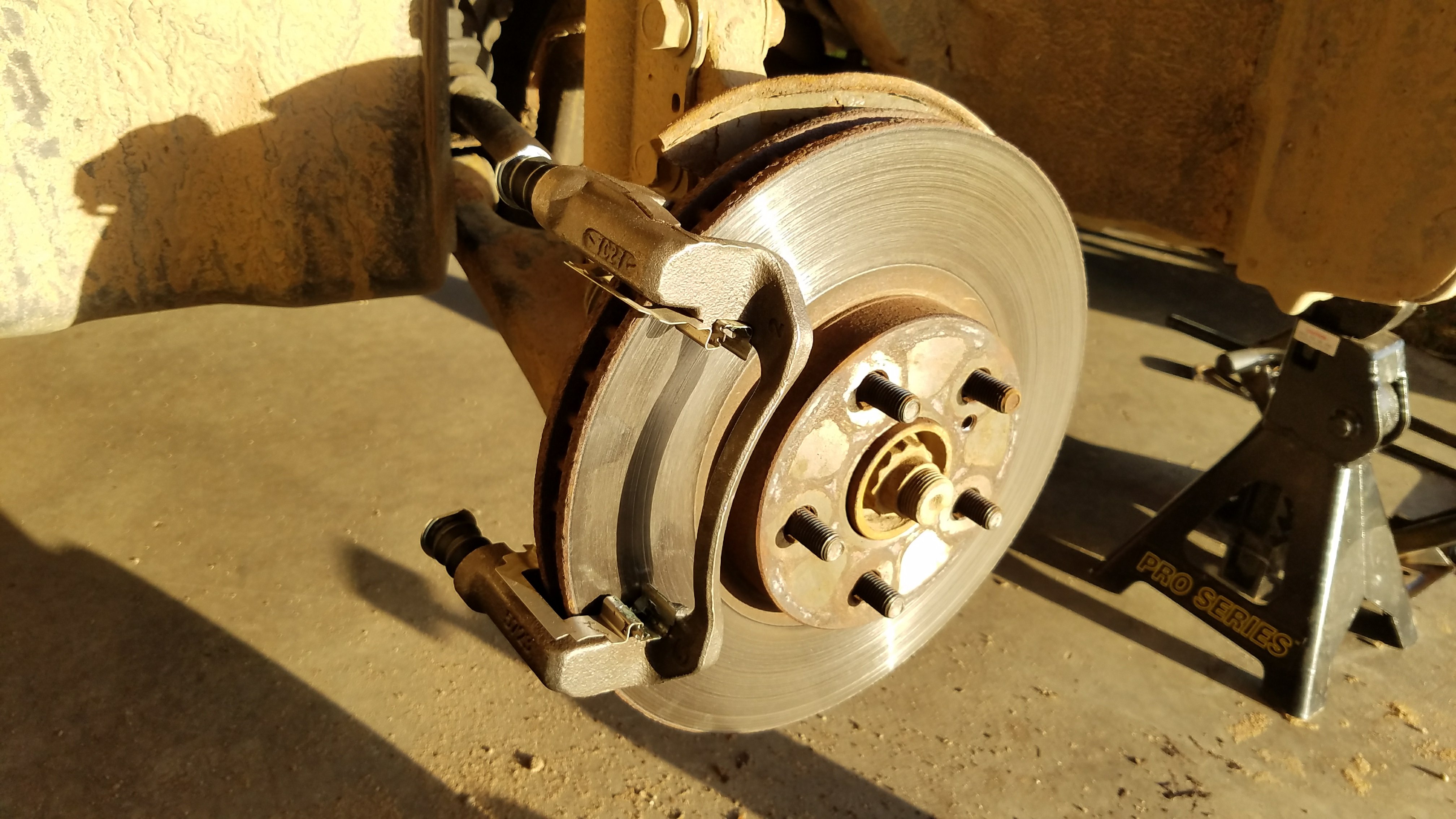 New Caliper bracket installed.