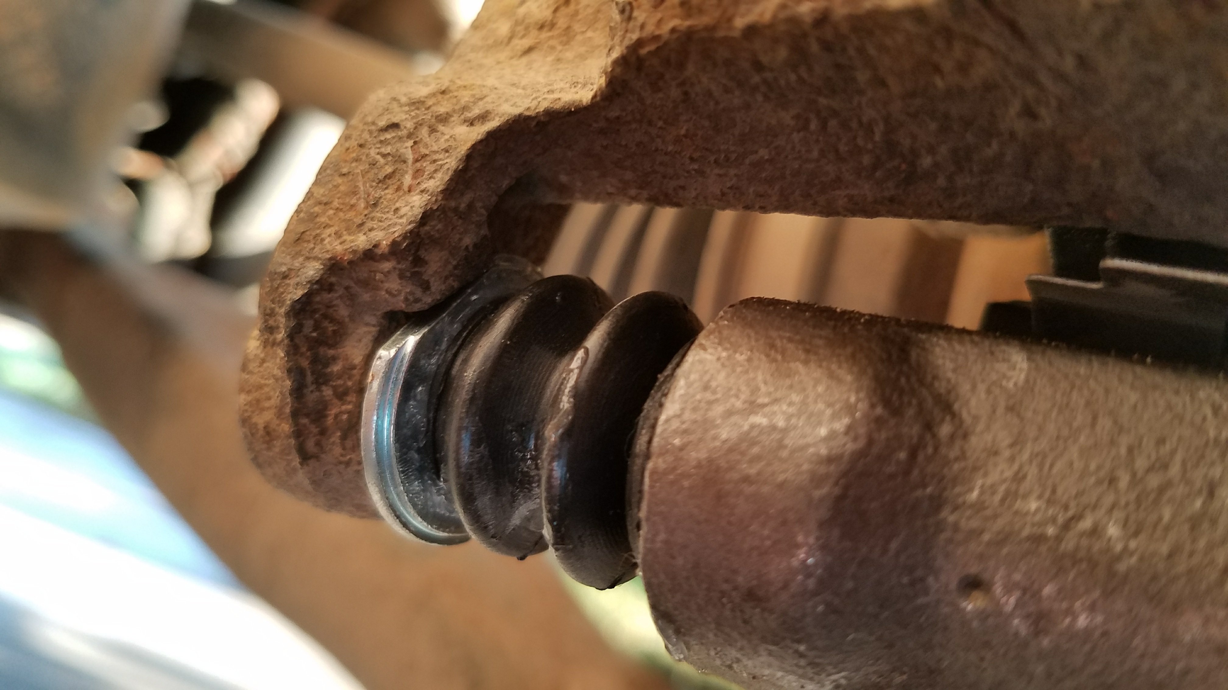 Line up the tab correctly on the caliper bracket.