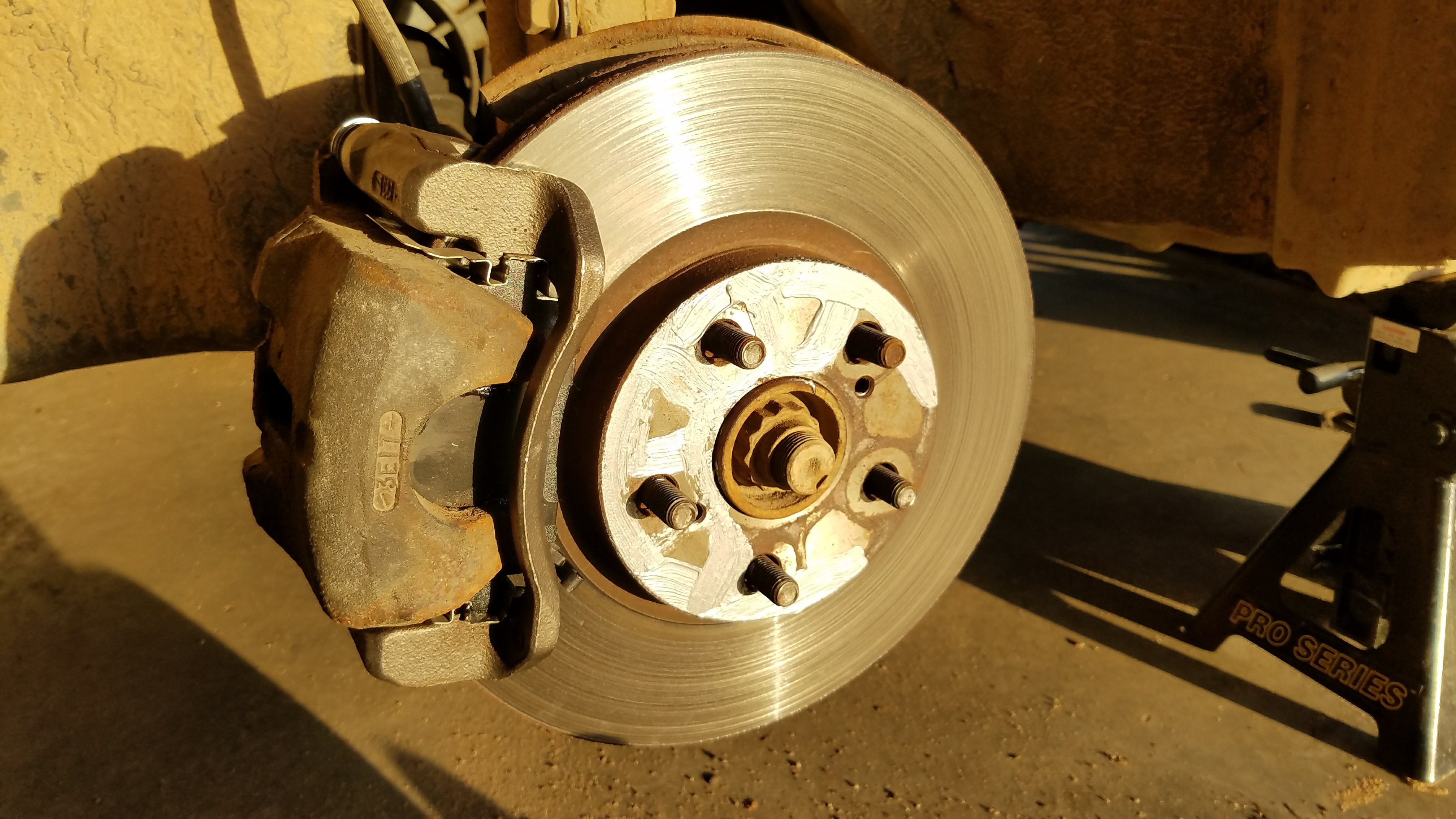 The new caliper bracket installed.