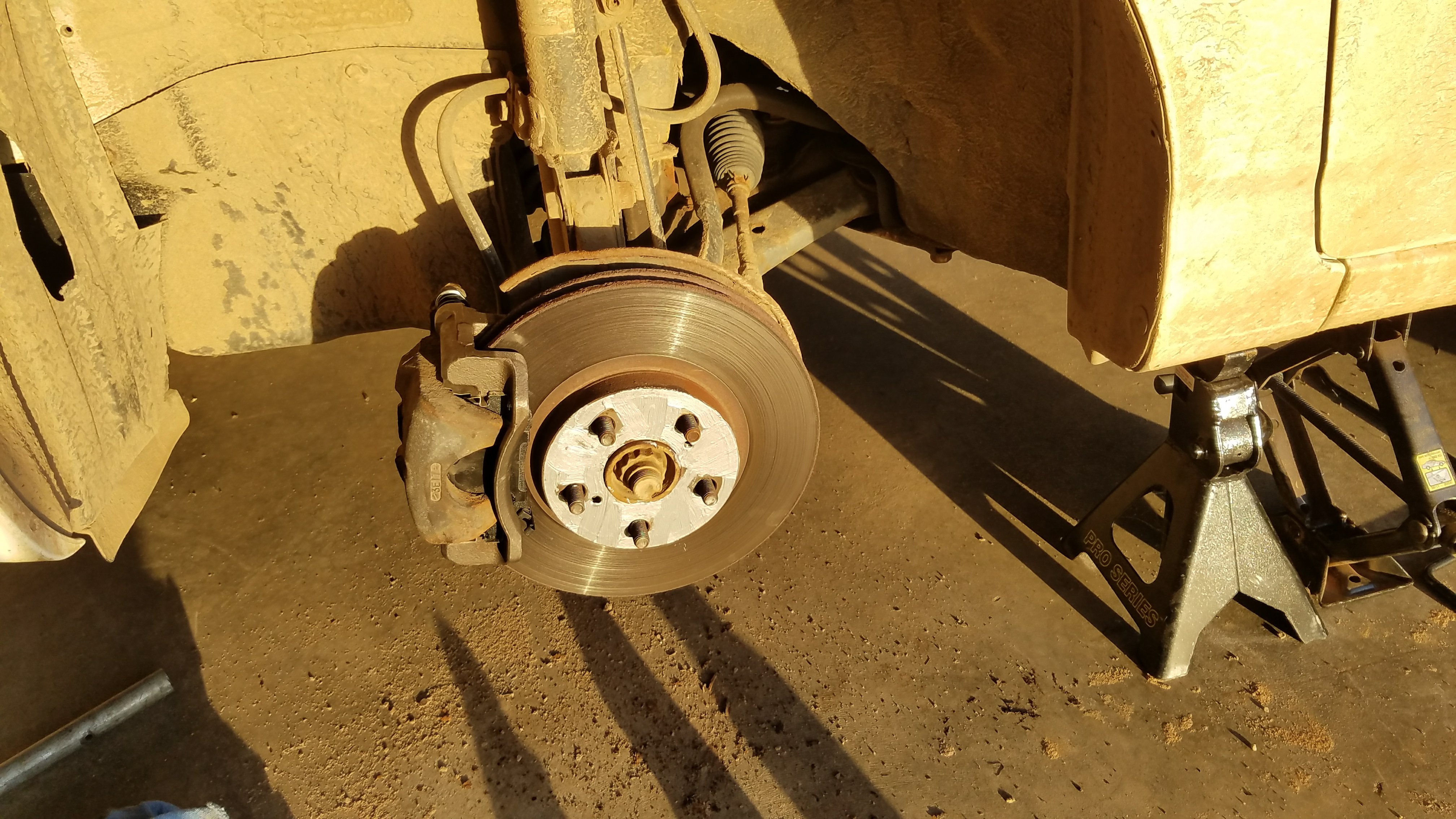 Caliper visible on the rotor.
