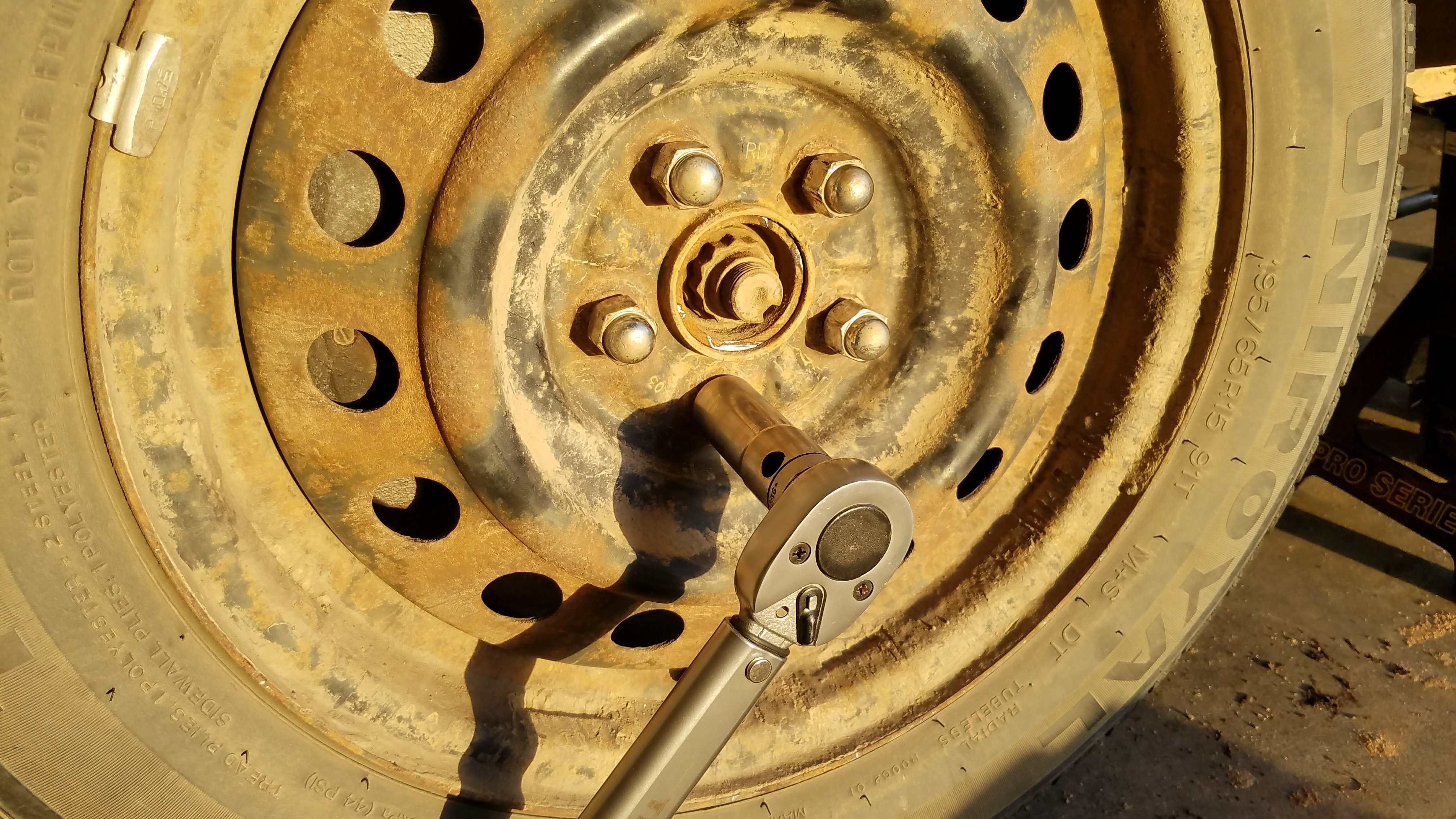 Properly torque the lug nuts to 76 ft-lbs on a 2004 toyota corolla.