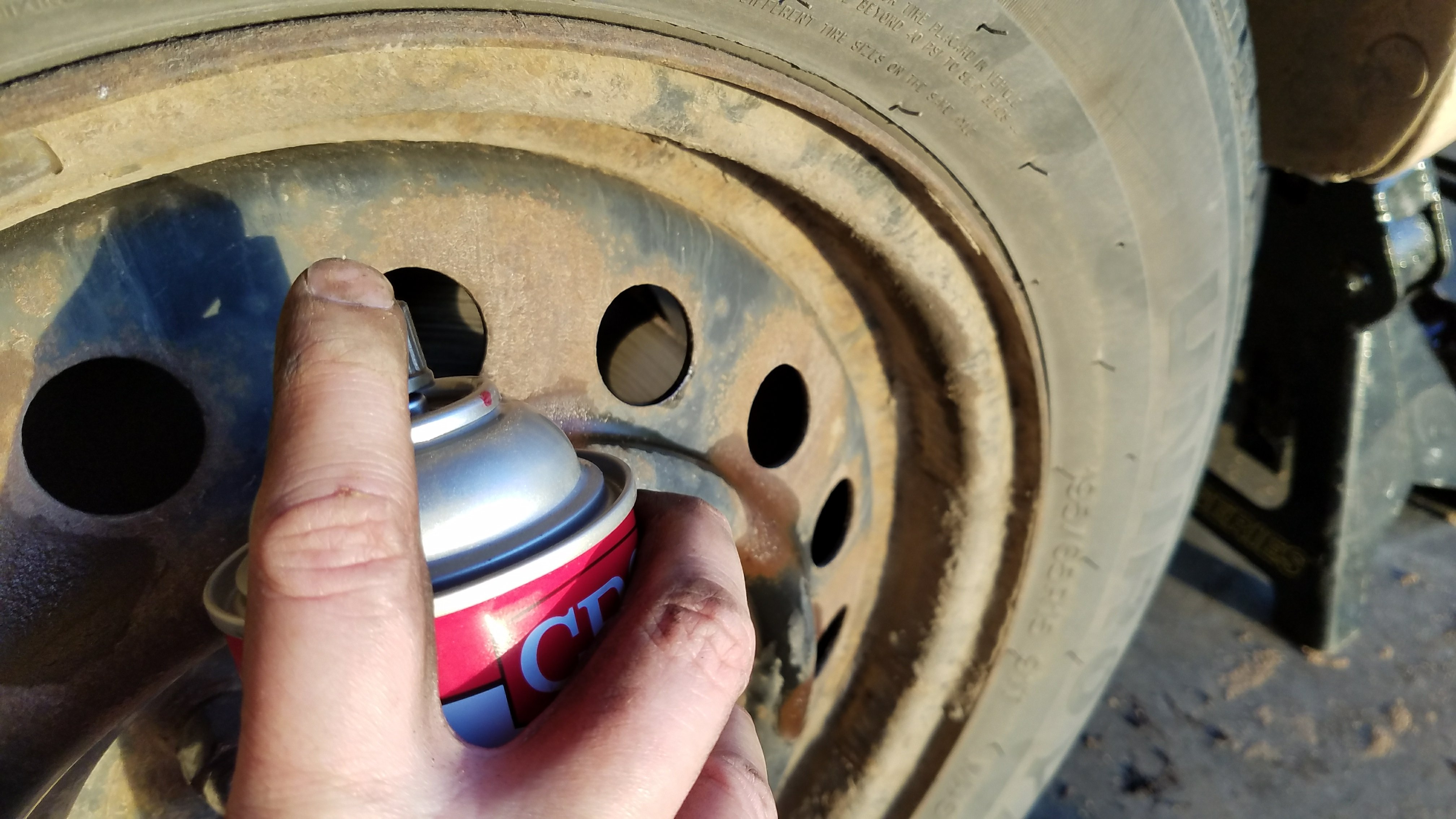 Spray brake cleaner on the corollas rotors.
