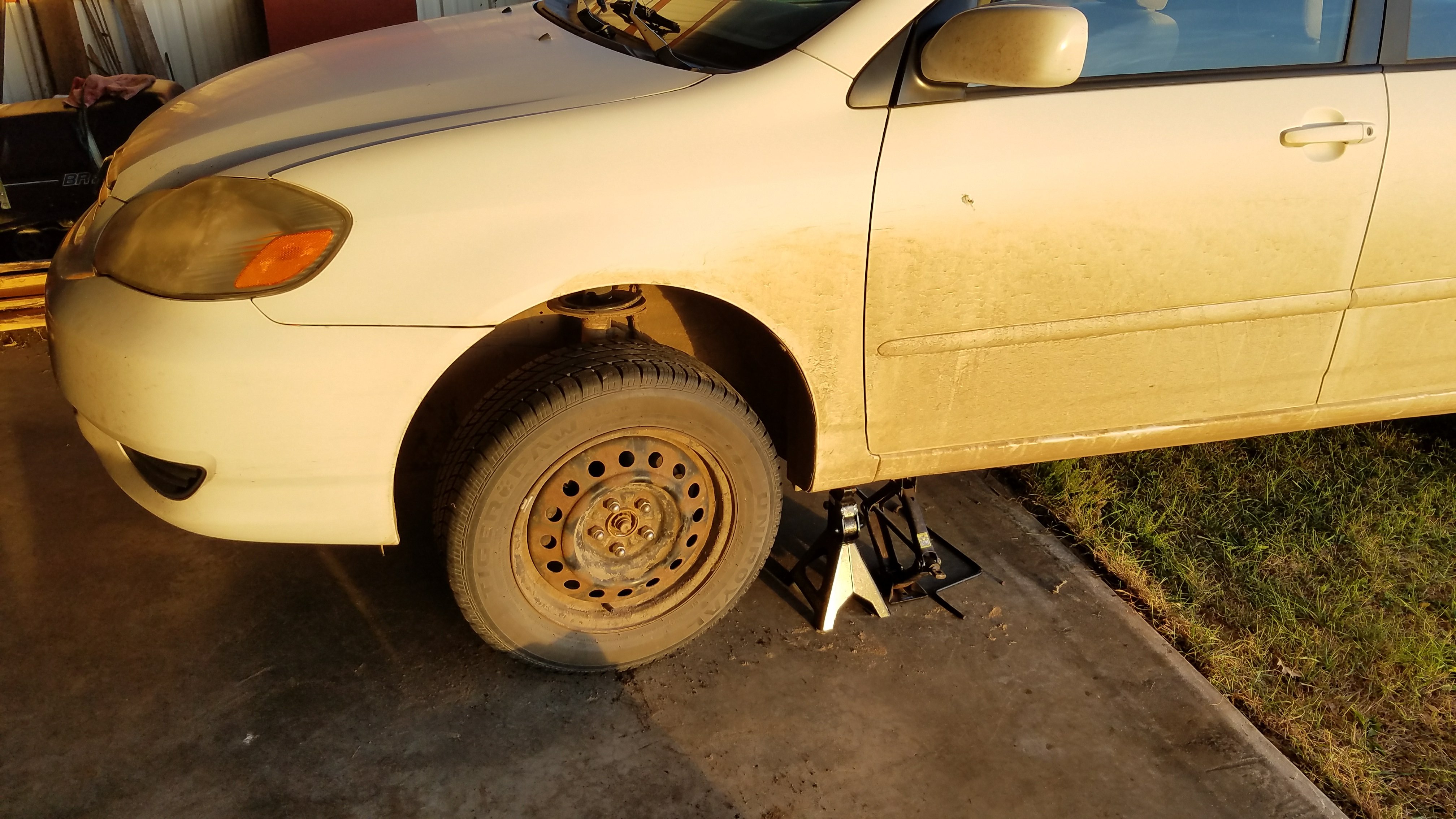 Jack up the vehicle and use a jack stand.