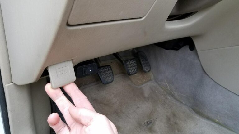 Release the hood of a Corolla