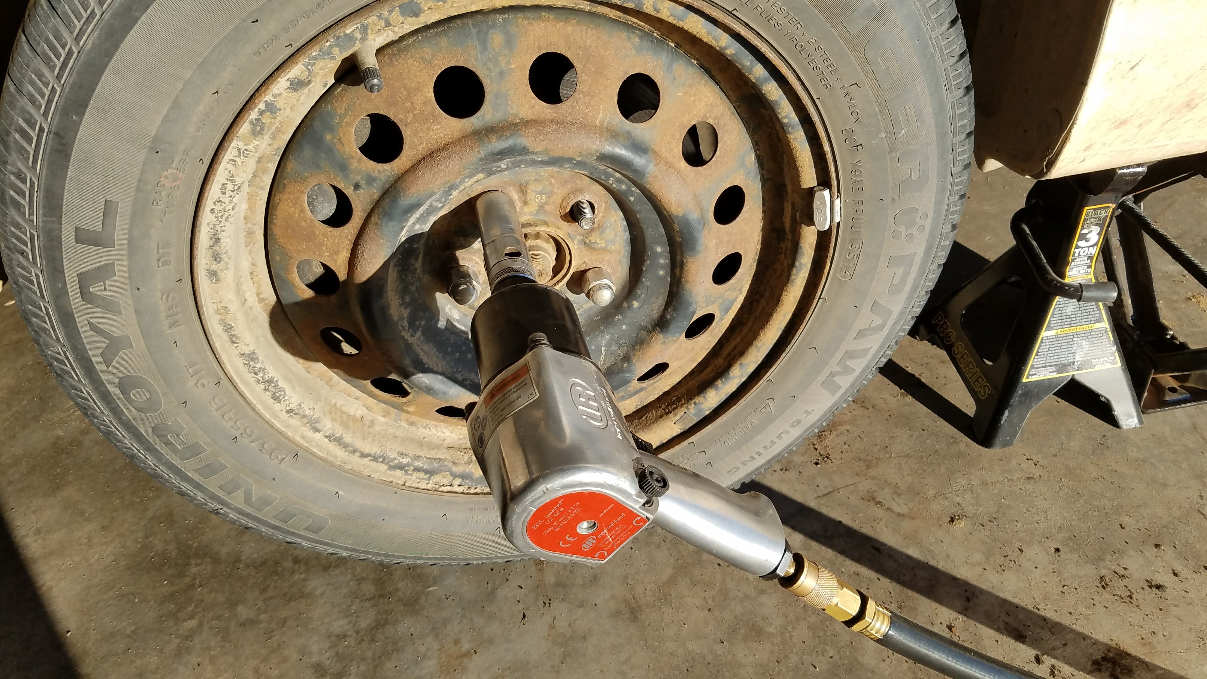 Remove the lug nuts.