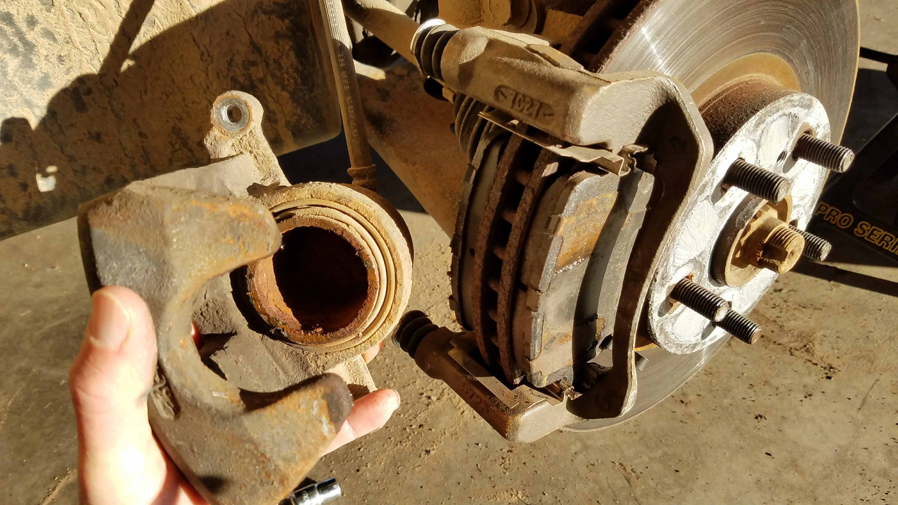 Caliper removed from the bracket.