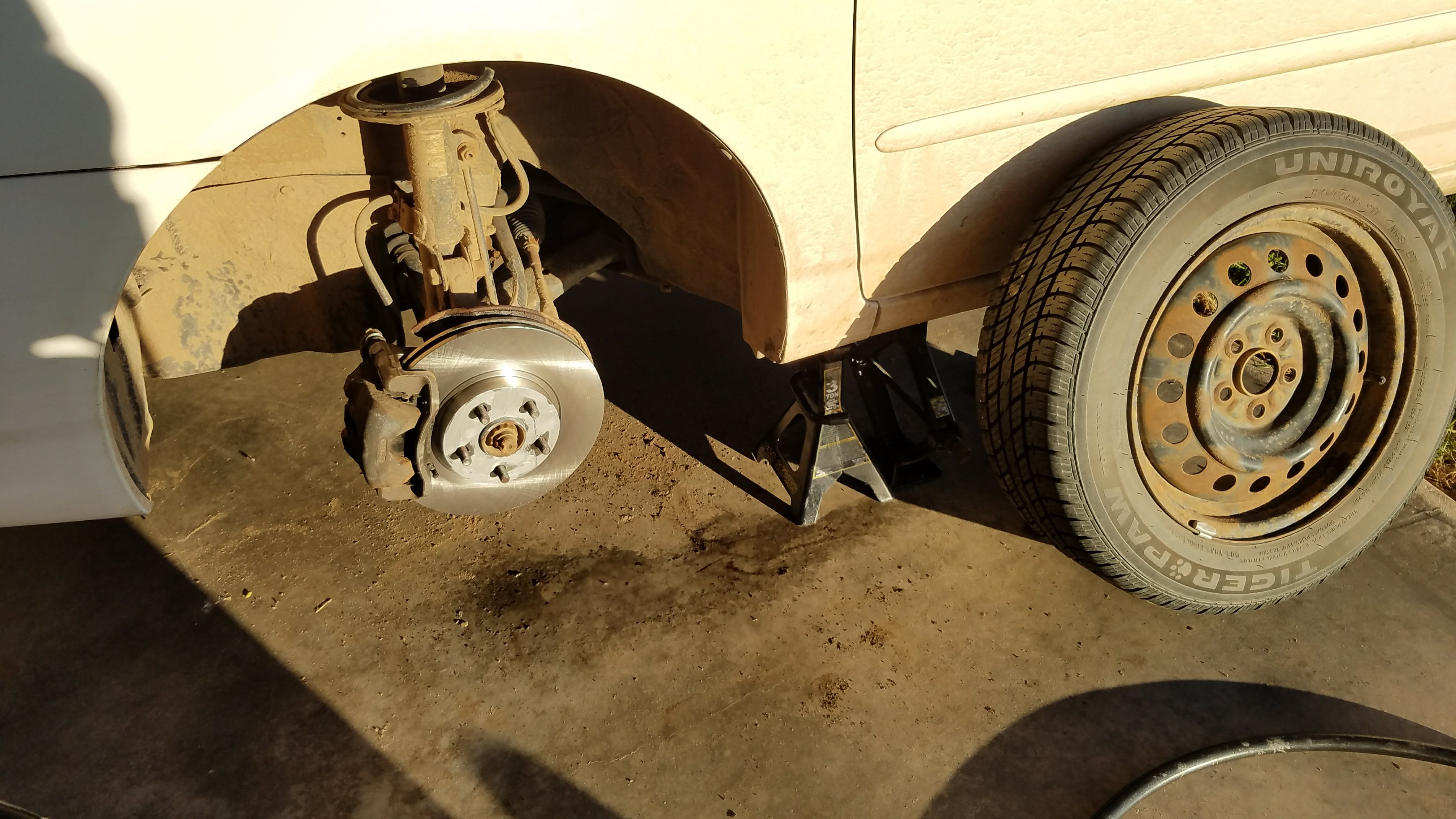 The new rotor installed before the tire is put on.