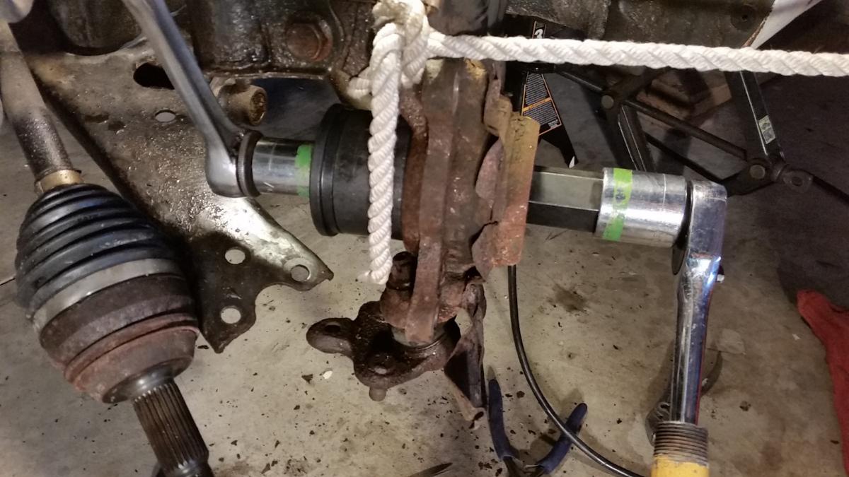 Pushing out the old bearing.