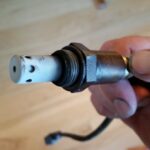 The old oxygen o2 sensor from a toyota corolla.