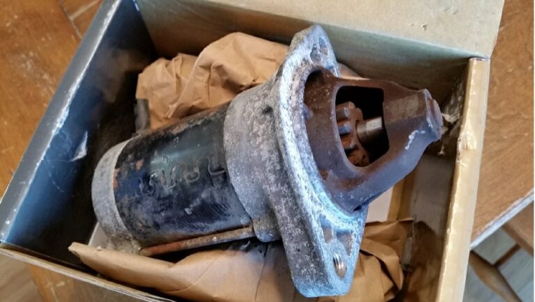 The old starter removed from a corolla.