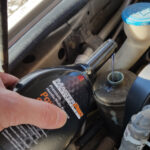 adding power steering fluid