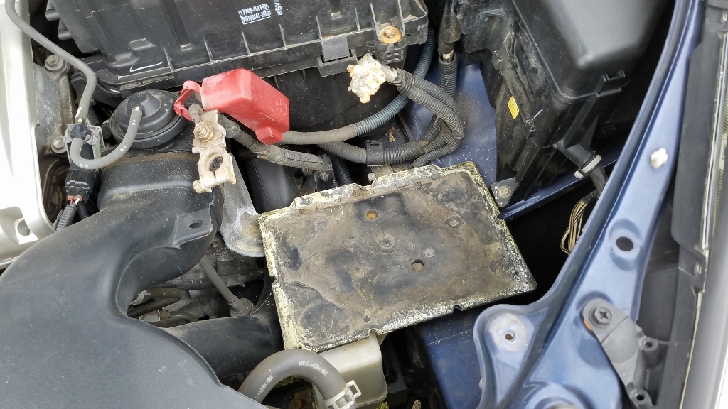 battery-removed-corrosion-visible