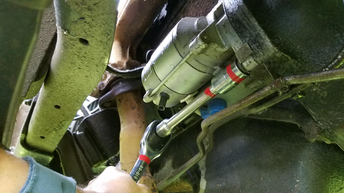 003-remove-bottom-starter-bolt