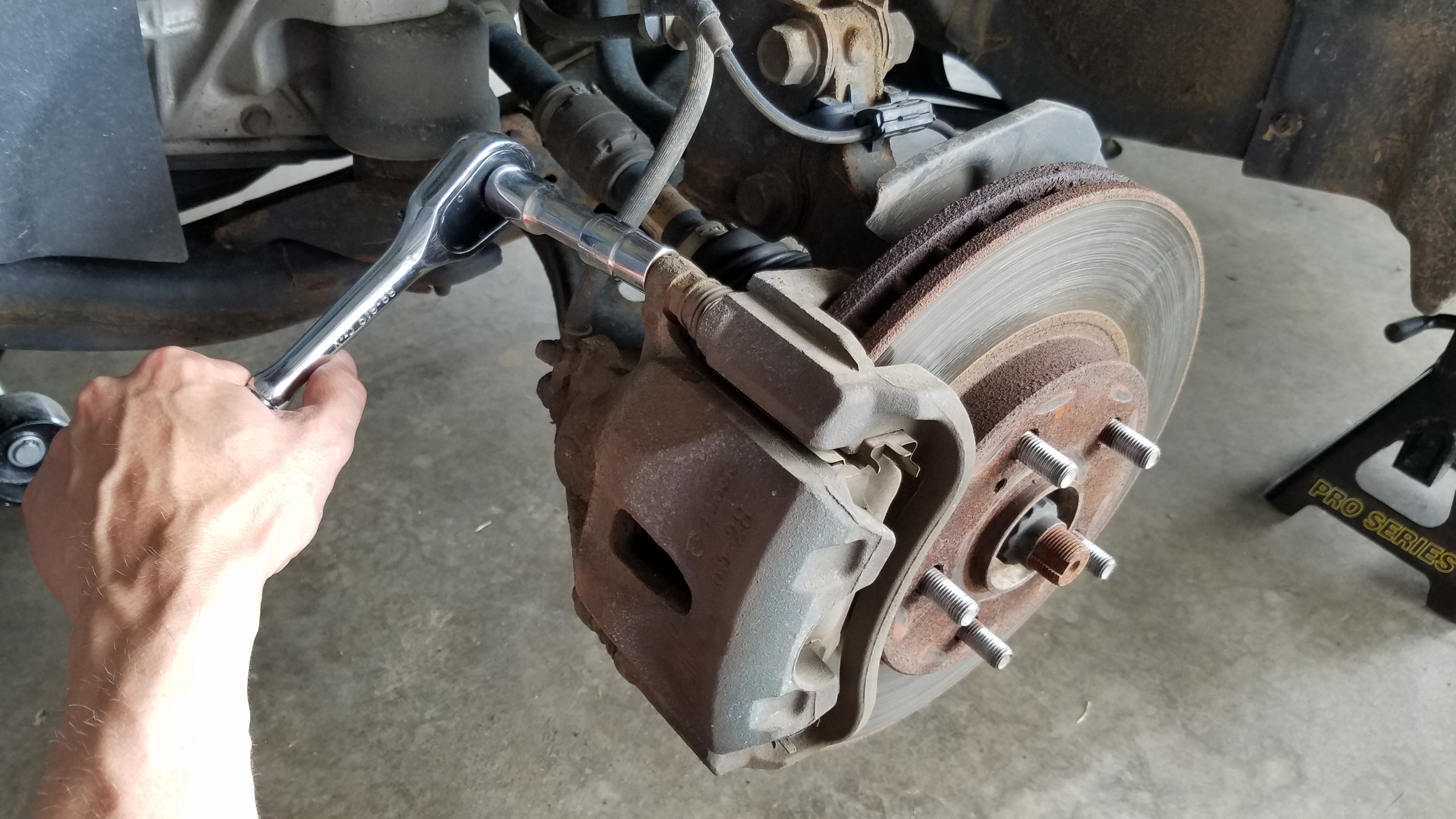 008-loosen-caliper-14mm-upper