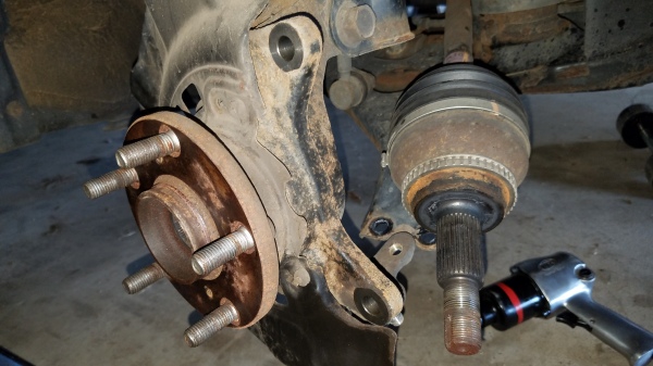 040-axle-pulled-out-of-hub