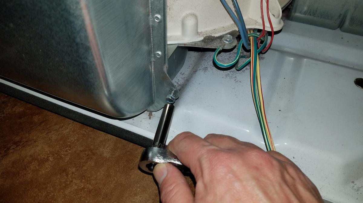 tighten-lower-panel-screw-dryer