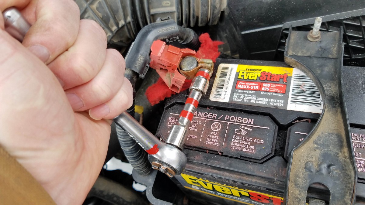 12-tighten-battery-clamp-positive