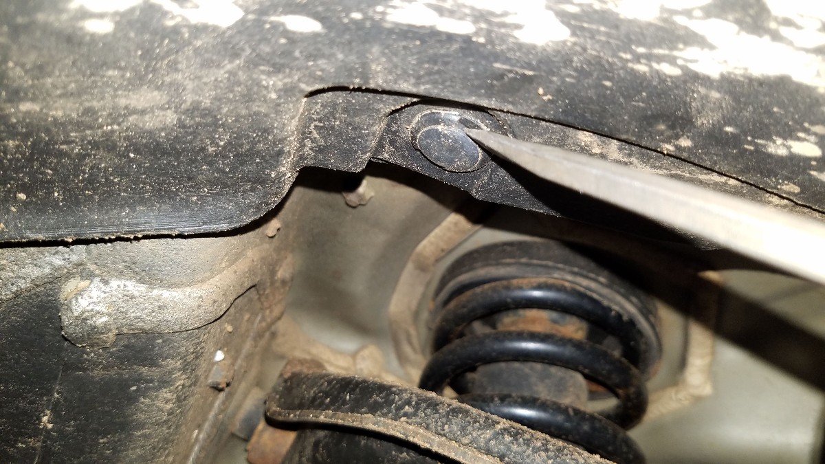 03-remove-plastic-fender-clip-screwdriver