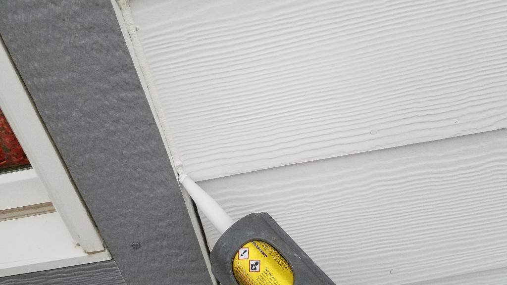 03-applying-caulking-to-window-trim