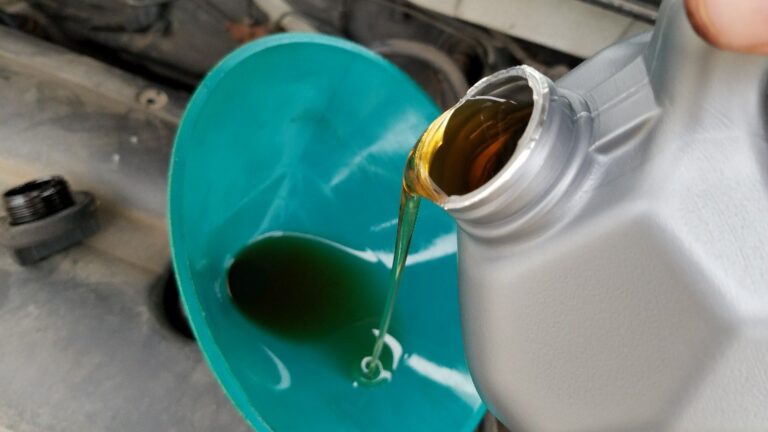 Motor Oil Pouring into a Toyota Corolla - Mobil1