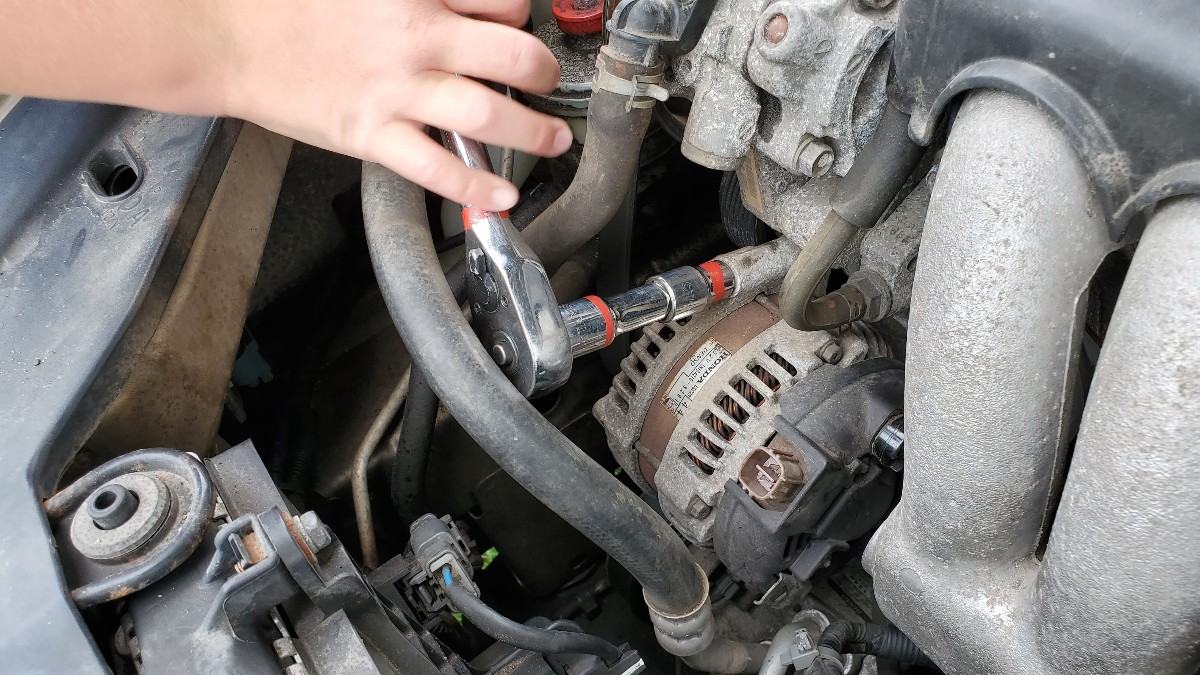 15-remove-mounting-bolt-12mm-alternator-Honda-Accord