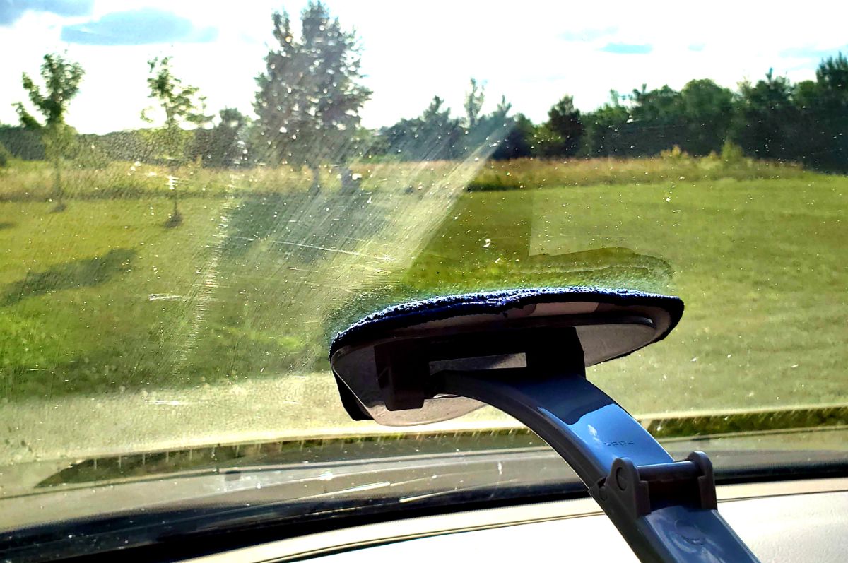 Clean the scum off the inside of the windshield