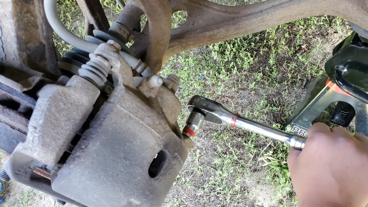 Removing lower caliper bolt Honda Accord