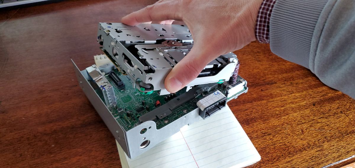 dismantling a car radio from a 2004 Honda Accord