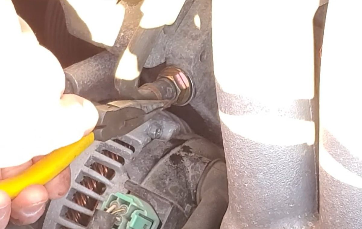PCV Valve Remove hose clamp with a pliers